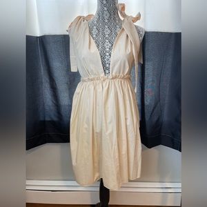 Beige knee length v-neck dress
